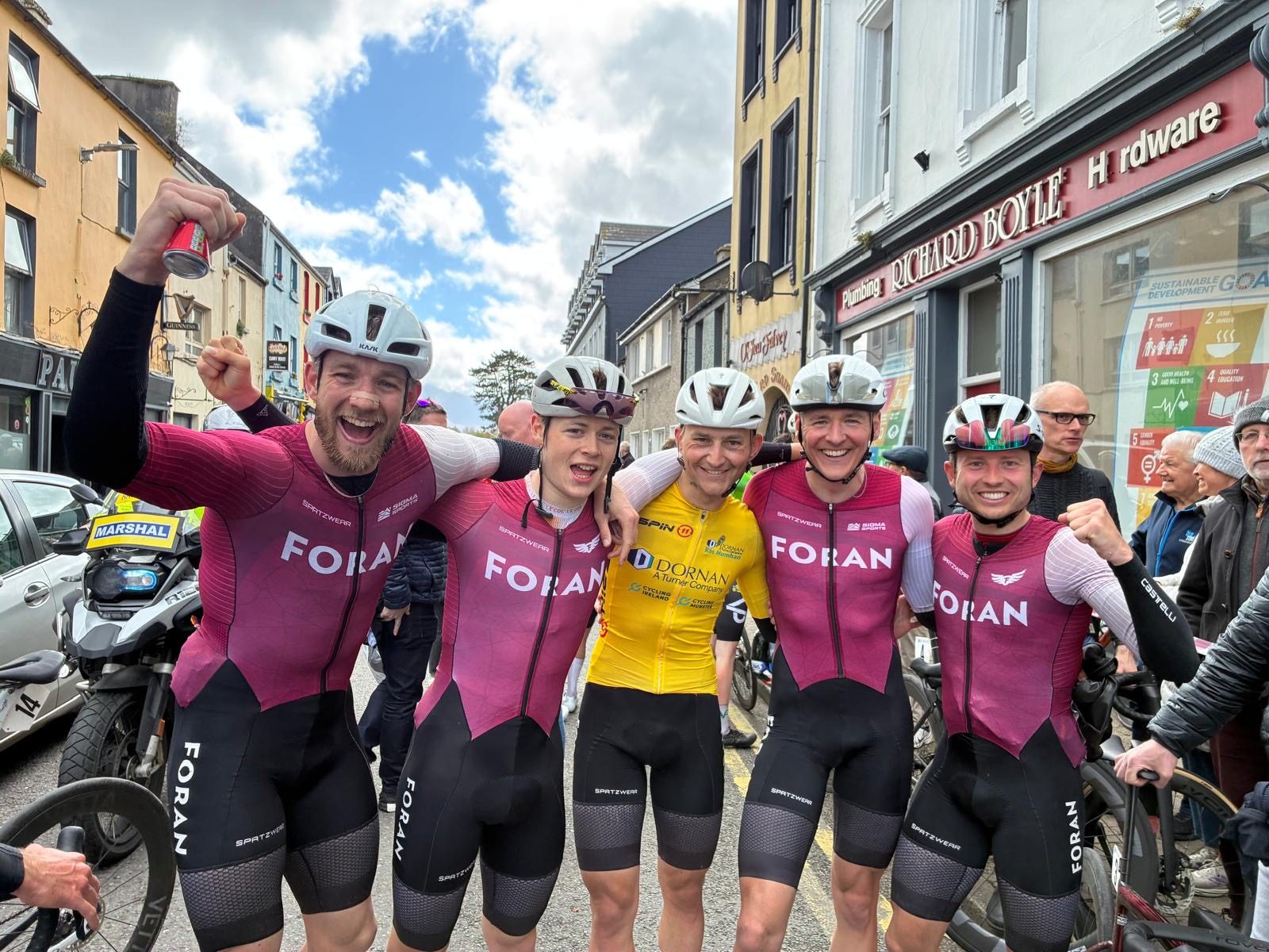 Tom celebrating with his FORAN teammates after a stage race