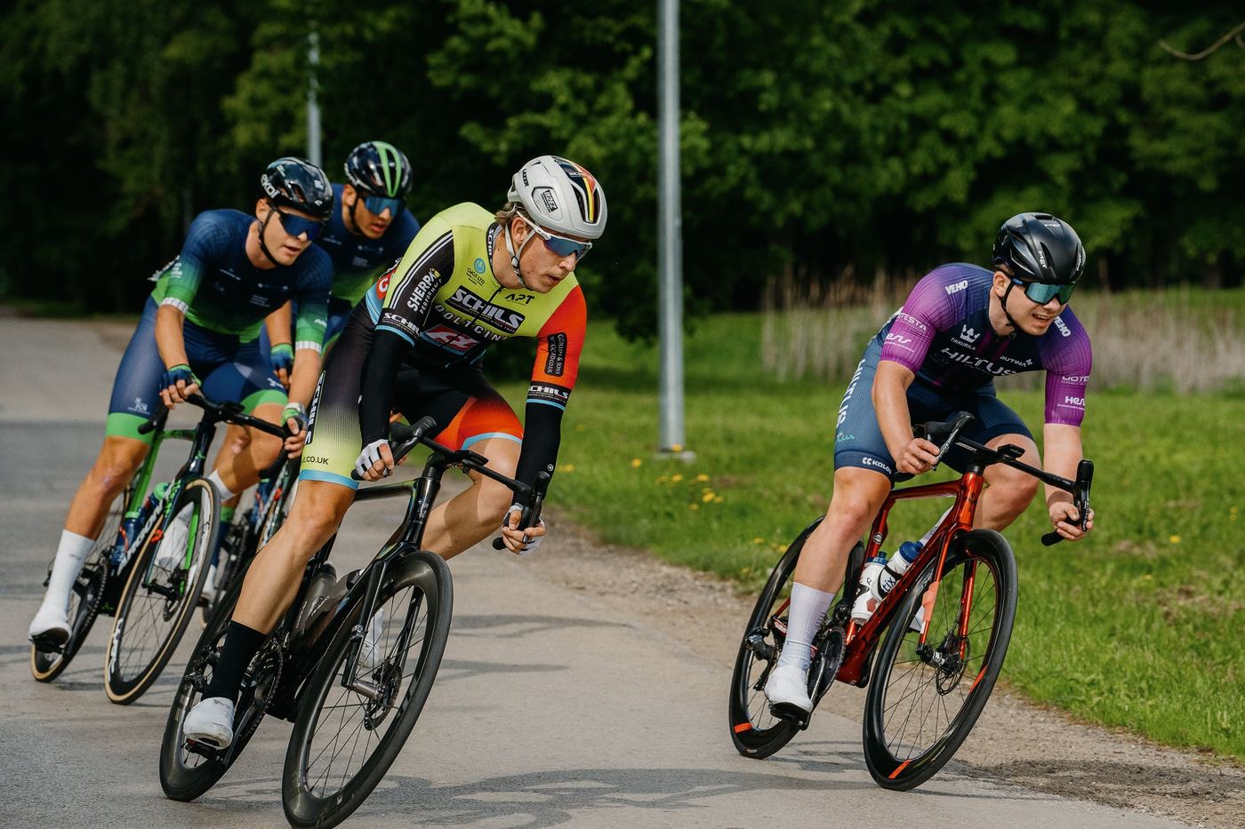 2EZ athletes racing a criterium through a corner